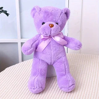 Urso de pelúcia com fita – presente decorativo e fofo.