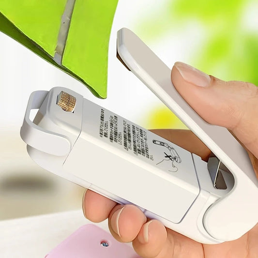 Seladora Térmica: Compacta, portátil, para embalar alimentos.