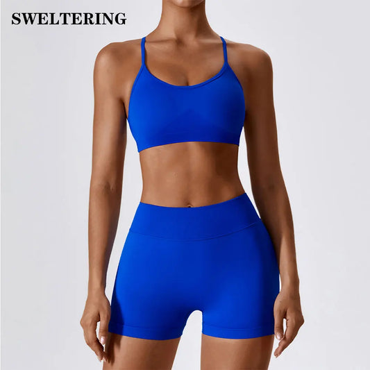 Conjunto fitness sem costura – top e shorts femininos.